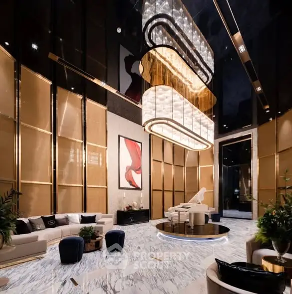 Luxurious modern living room with high ceilings and elegant chandelier