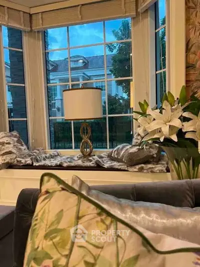 Charming living room with cozy window seat and elegant decor