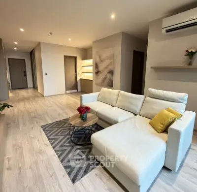 Spacious modern living room with stylish decor and cozy seating area