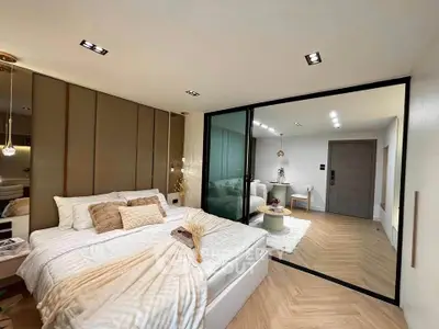 Luxurious modern bedroom with glass partition and elegant decor