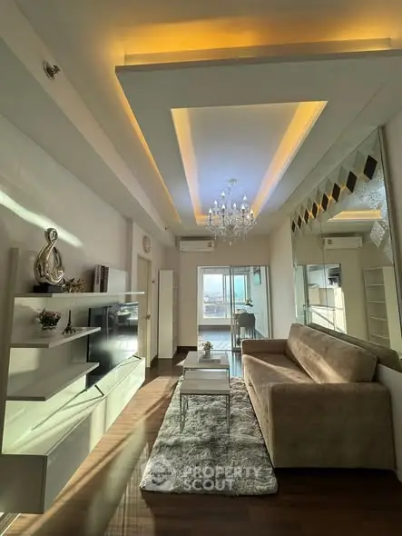 Luxurious living room with modern decor and elegant lighting