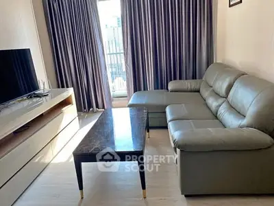 Modern living room with sleek furniture and natural light