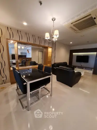 Spacious modern living room with elegant dining area and stylish decor