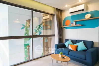 Modern living room with stylish decor and large window view