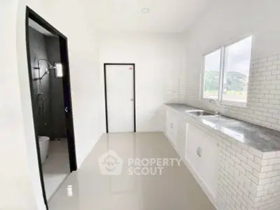 Spacious kitchen with modern design and ample natural light