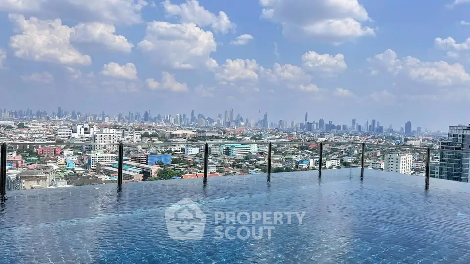 Stunning rooftop infinity pool with panoramic city skyline view
