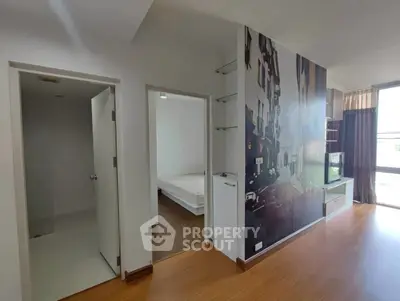 Modern apartment interior with stylish wall art and natural light