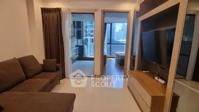 Modern apartment living room with city view and sleek furnishings