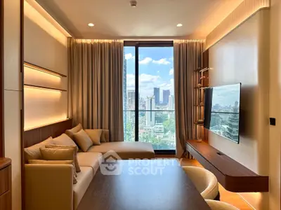 Luxurious living room with stunning city view, modern decor, and cozy seating area.