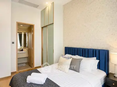 Luxurious bedroom with ensuite bathroom and elegant decor