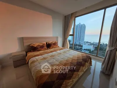 Modern bedroom with stunning ocean view and large windows