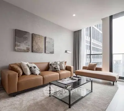Modern living room with leather sofa and city view