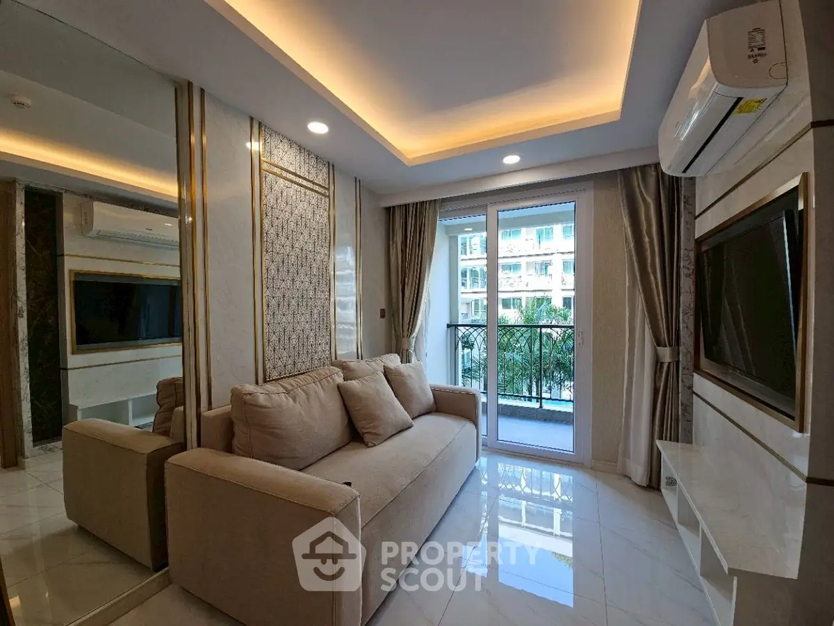 Luxurious living room with modern decor and balcony view in upscale apartment