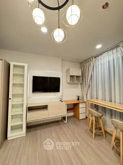 Modern living room with stylish furniture and elegant lighting