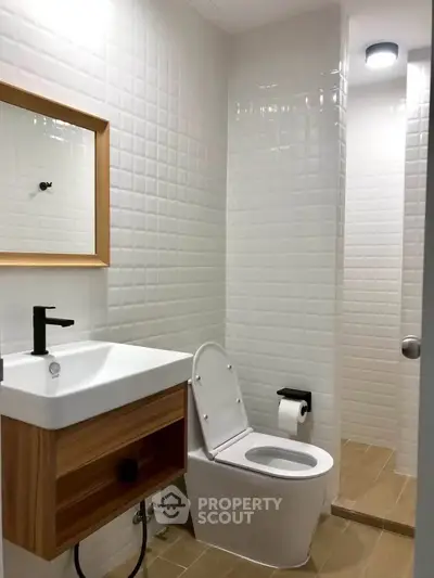 Modern bathroom with sleek fixtures and stylish tile design