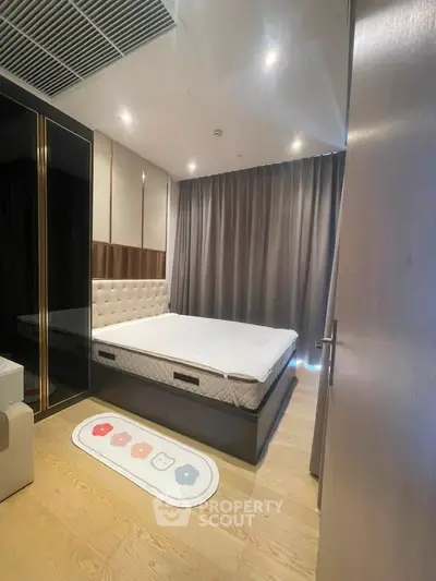 Modern bedroom with stylish decor and large bed in a cozy apartment