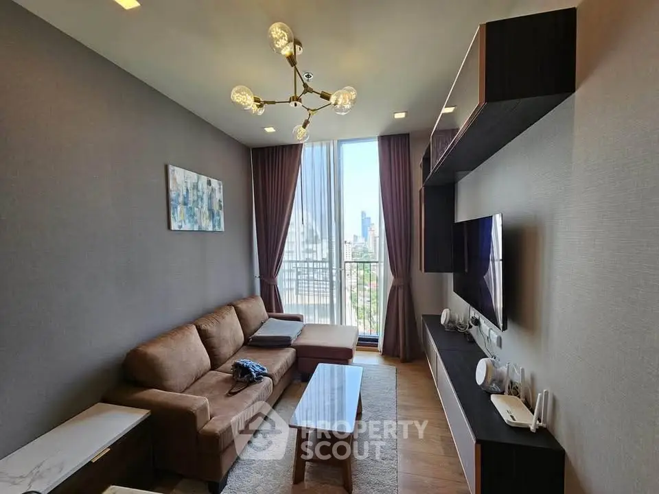 Modern living room with city view, stylish furniture, and elegant lighting