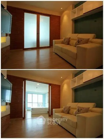 Spacious living room with modern decor and sliding doors leading to a bright area.