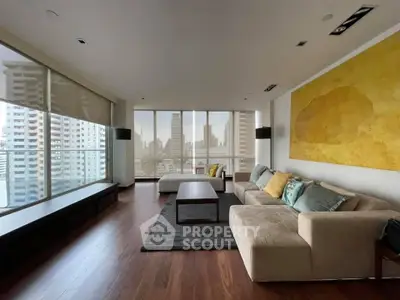 Spacious modern living room with city view and elegant decor