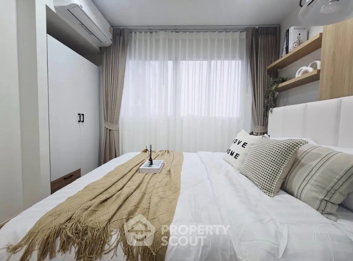 Cozy bedroom with modern decor and natural light