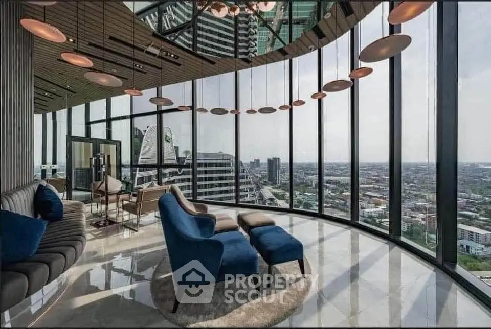 Luxurious high-rise living room with panoramic city views and modern furnishings.