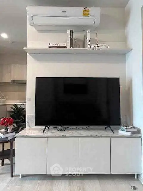 Modern living room with sleek TV setup and stylish decor