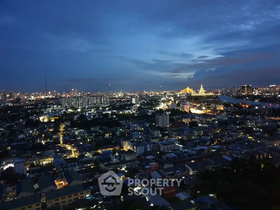 Stunning cityscape view at dusk showcasing vibrant city lights and skyline.
