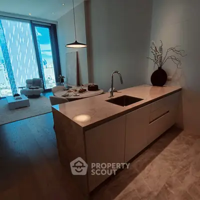 Luxurious open-plan kitchen with stunning city view, modern furnishings, and elegant decor in high-rise apartment.