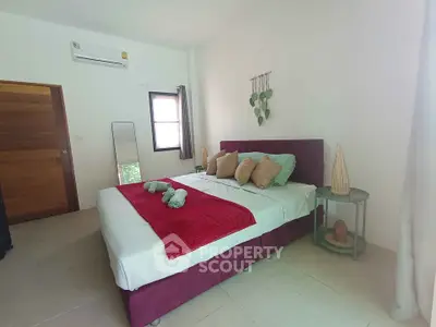 Cozy bedroom with modern decor and natural light