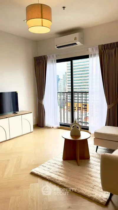 Modern living room with city view, stylish furniture, and natural light.