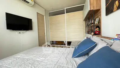 Modern bedroom with stylish decor and built-in wardrobe