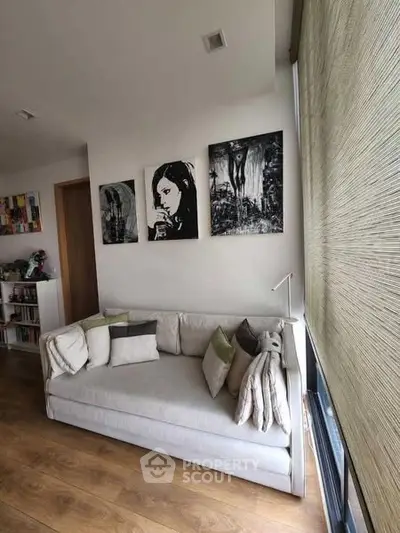 Cozy living room with modern art and natural light