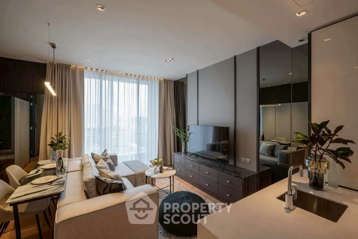 Modern living room with stylish decor and open kitchen layout