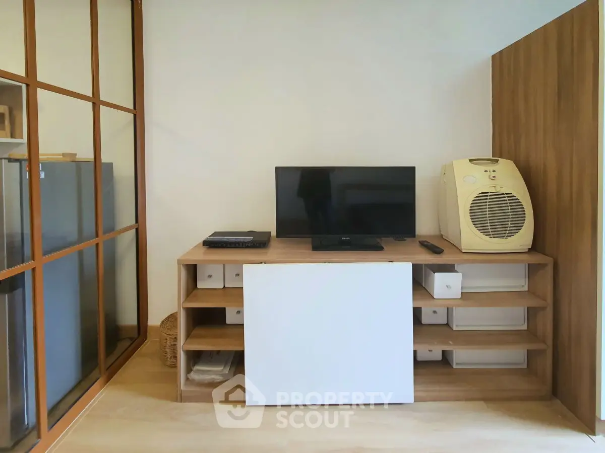 Modern living room with sleek TV stand and minimalist decor