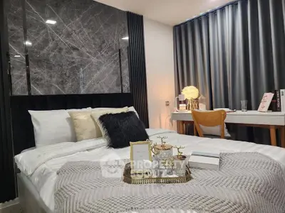 Luxurious bedroom with elegant decor and cozy ambiance, featuring a stylish bed and modern furnishings.