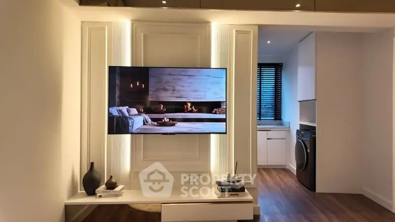 Modern living room with wall-mounted TV and stylish decor