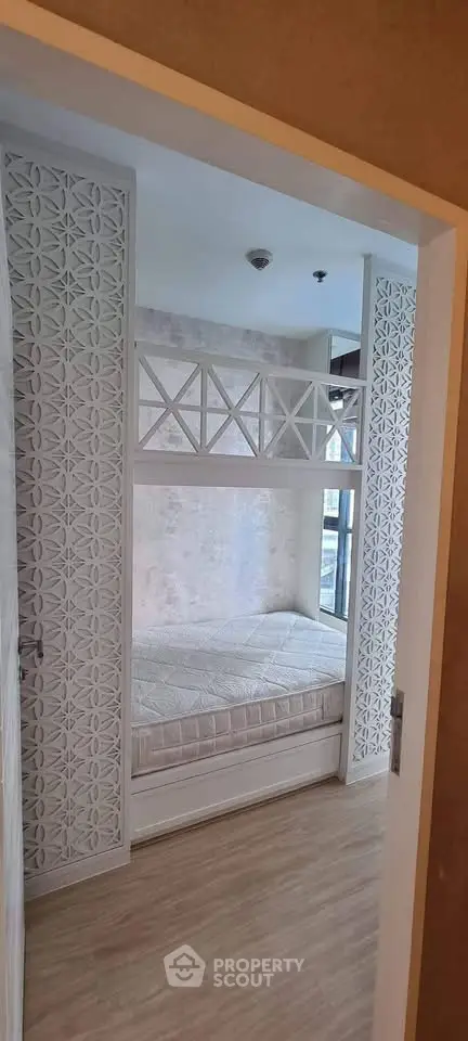 Cozy bedroom with stylish bunk bed and elegant decor