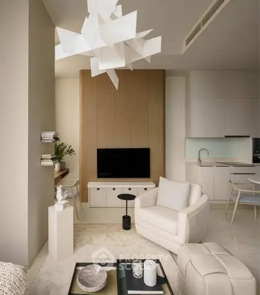 Modern living room with stylish decor and open kitchen layout