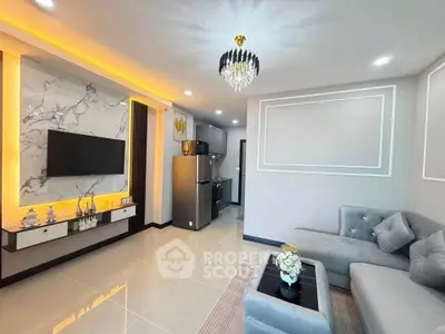 Modern living room with elegant decor and open kitchen layout
