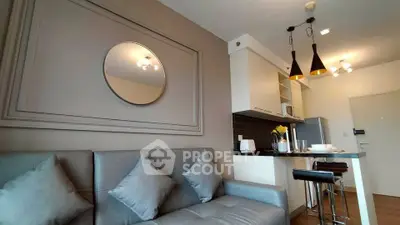 Modern living room with stylish decor and open kitchen layout