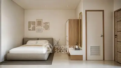 Modern minimalist bedroom with cozy bed and stylish decor