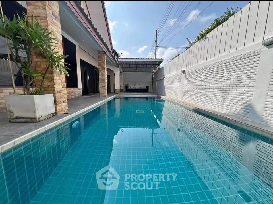 Stunning private pool with modern design and spacious outdoor area, perfect for relaxation and entertainment.