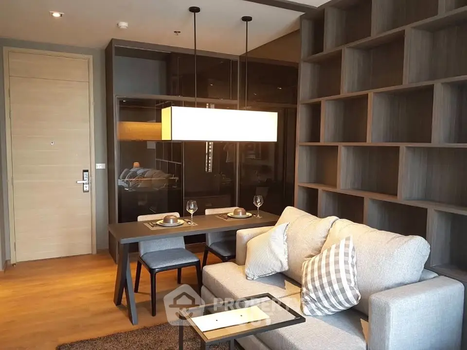 Modern living room with stylish dining area and cozy sofa in a contemporary apartment.