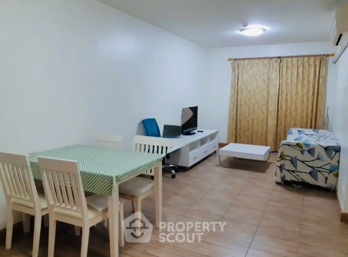 Spacious living room with modern furniture and natural light
