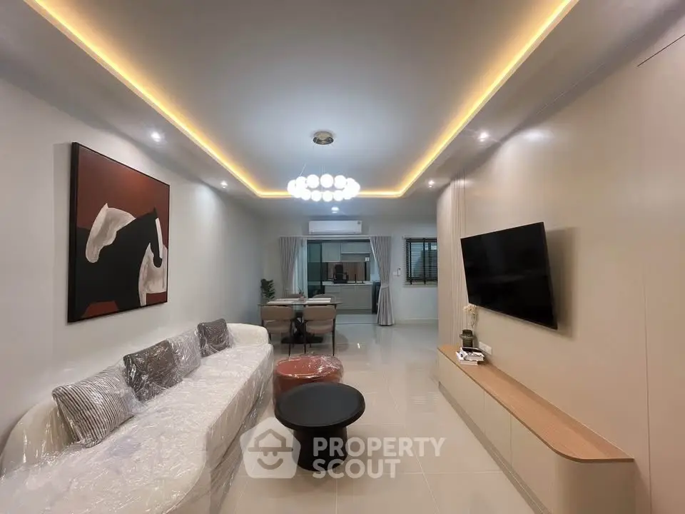 Modern living room with stylish lighting and contemporary decor
