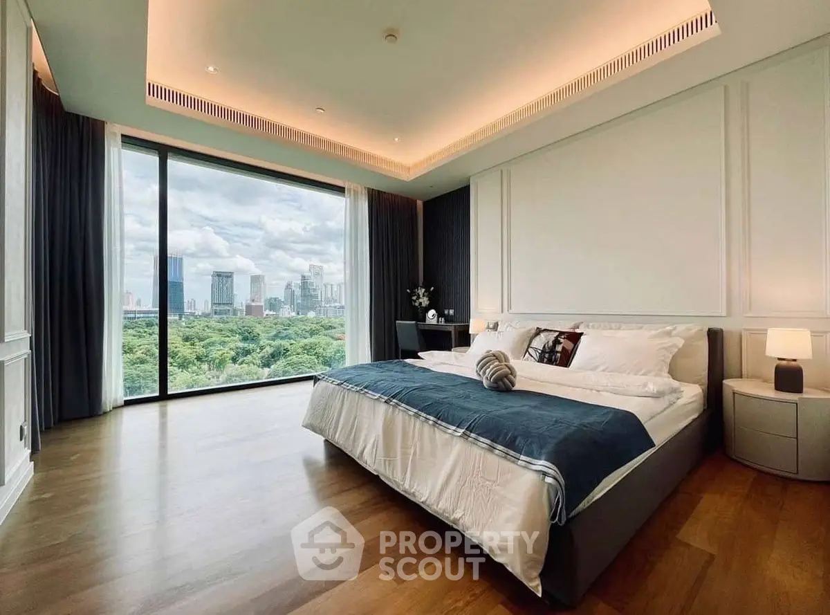 Luxurious bedroom with panoramic city view and elegant decor
