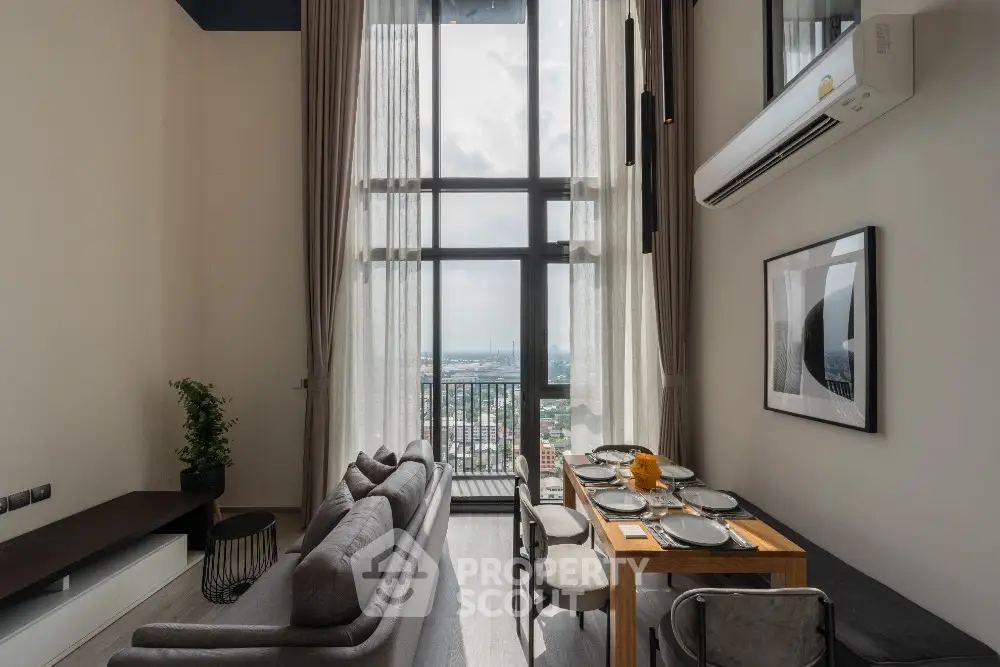 Luxurious high-ceiling living room with panoramic city view and elegant dining area.