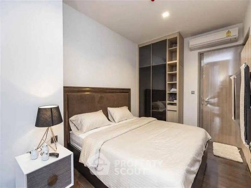 Modern bedroom with cozy bed and stylish decor