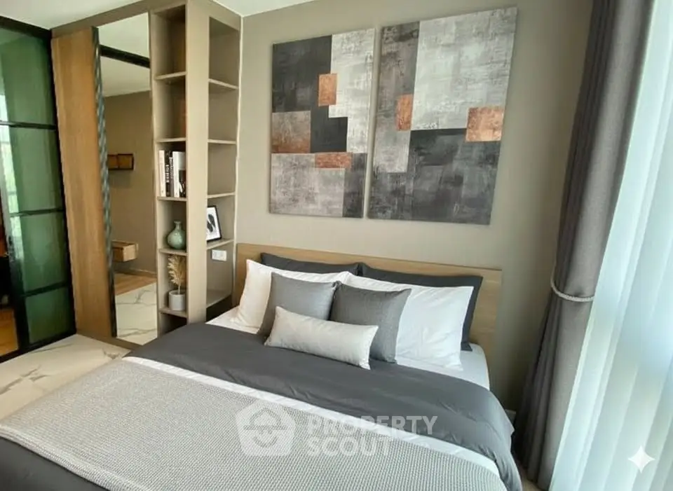 Modern bedroom with stylish decor and natural light