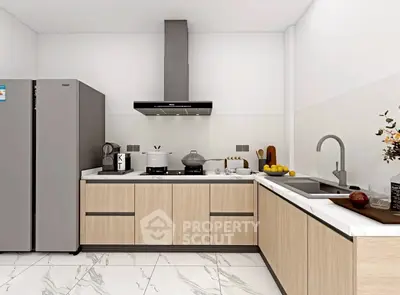 Modern kitchen with sleek appliances and marble flooring